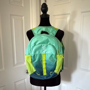 Firefly! Outdoor Gear Youth Backpack in a vibrant blue and green color.